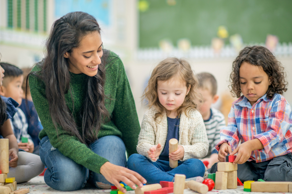 Teacher with children in class