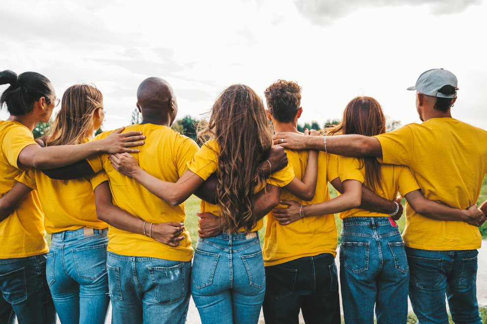 Group of teens embracing
